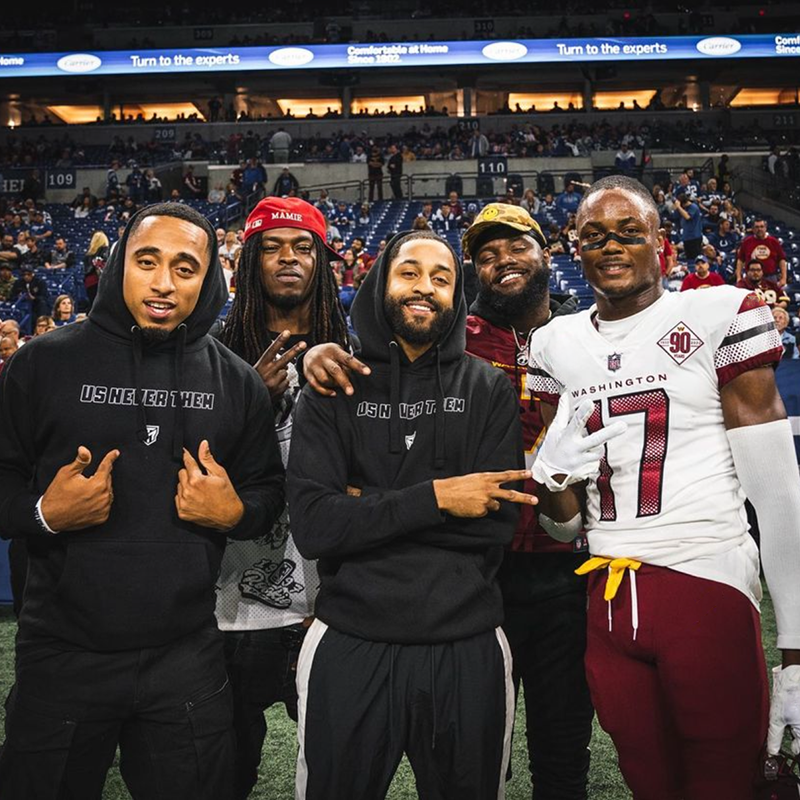 Terry McLaurin "Us Never Them" Hoodie Black